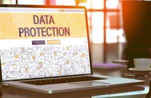 Data Protection - Closeup Landing Page in Doodle Design Style on Laptop Screen. On Background of Comfortable Working Place in Modern Office. Toned, Blurred Image. 3D Render.